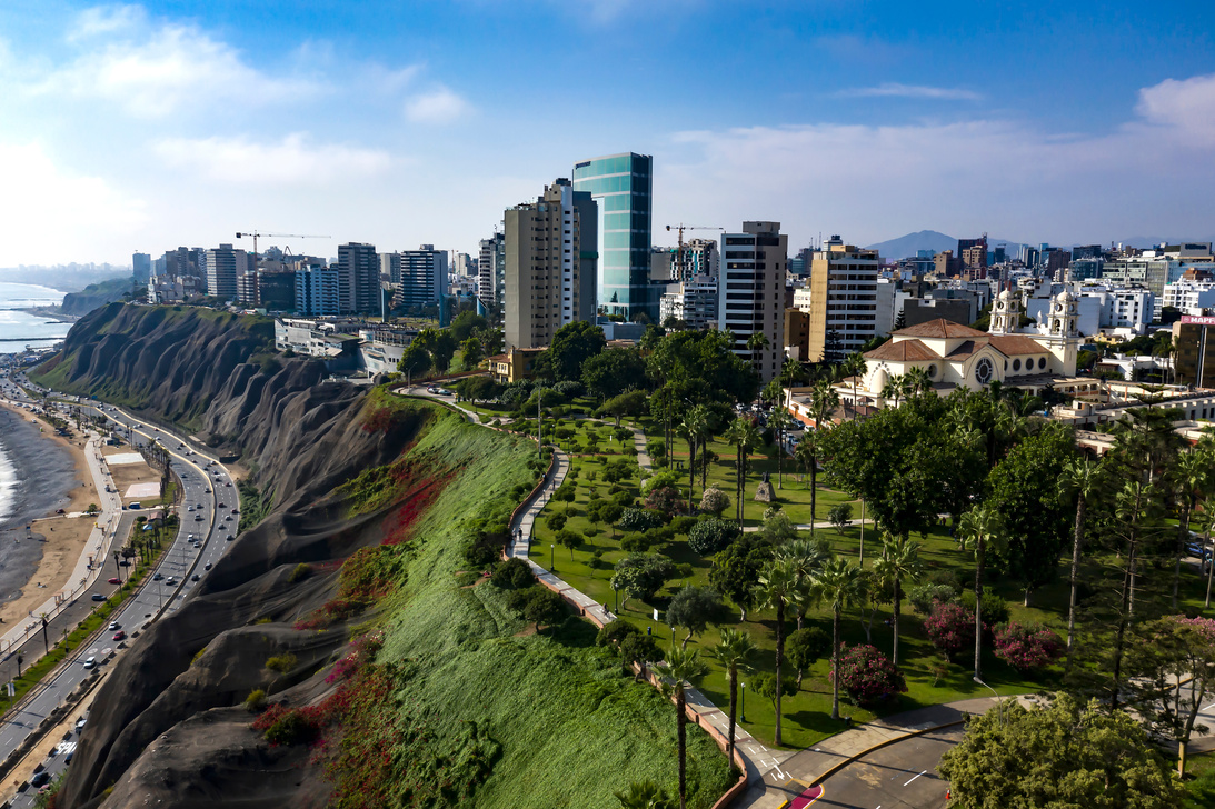 Aerial view of Miraflores park and Larcomar, drone shot of Lima's cityscape