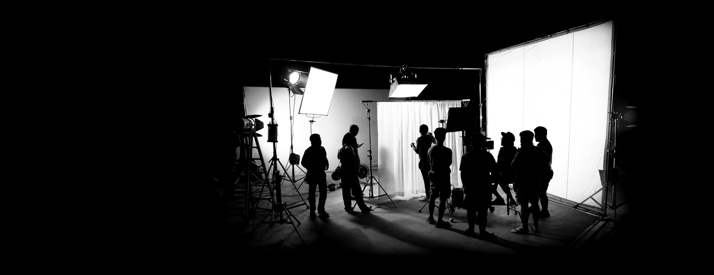 Silhouette of Film Production Crew in a Studio